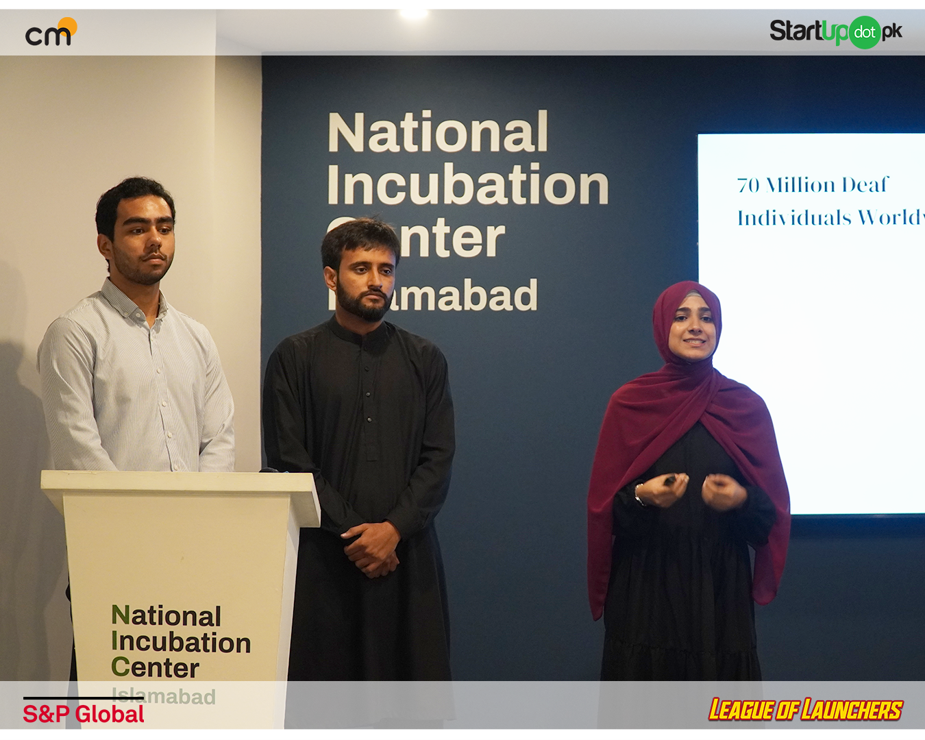 Team Credo presenting on stage at NIC Islamabad
